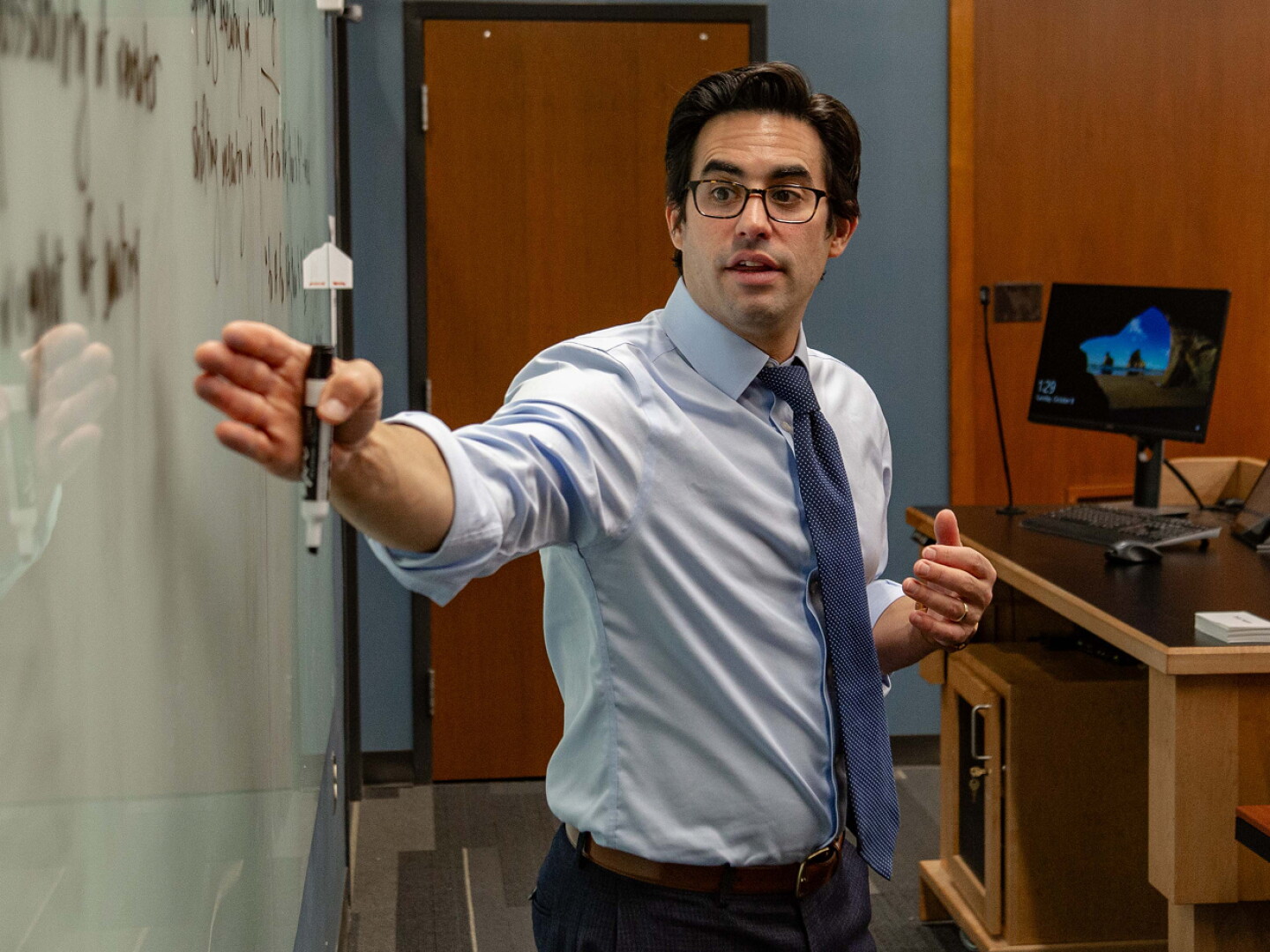 Faculty member lecturing in classroom