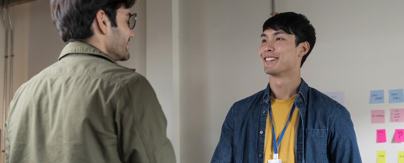 Intern shaking hands with employer