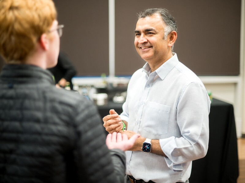 Student and faculty member having a discussion