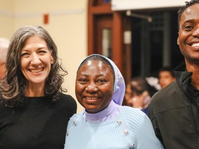 Students and faculty engaging at a community gathering at Santa Clara University