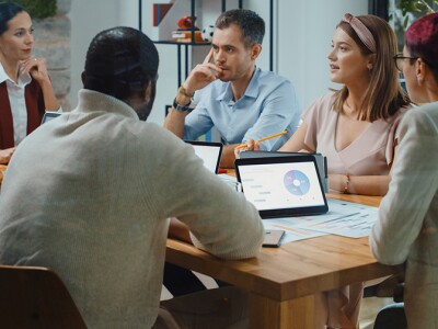 Digital Marketing Team Meeting in the Modern Office Conference Room