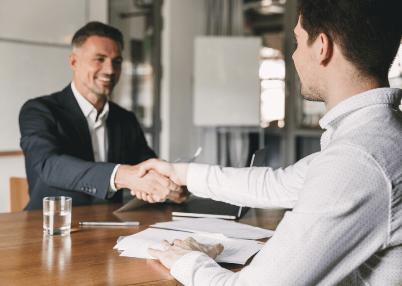 A man meeting with a human resources employee during the job interview process