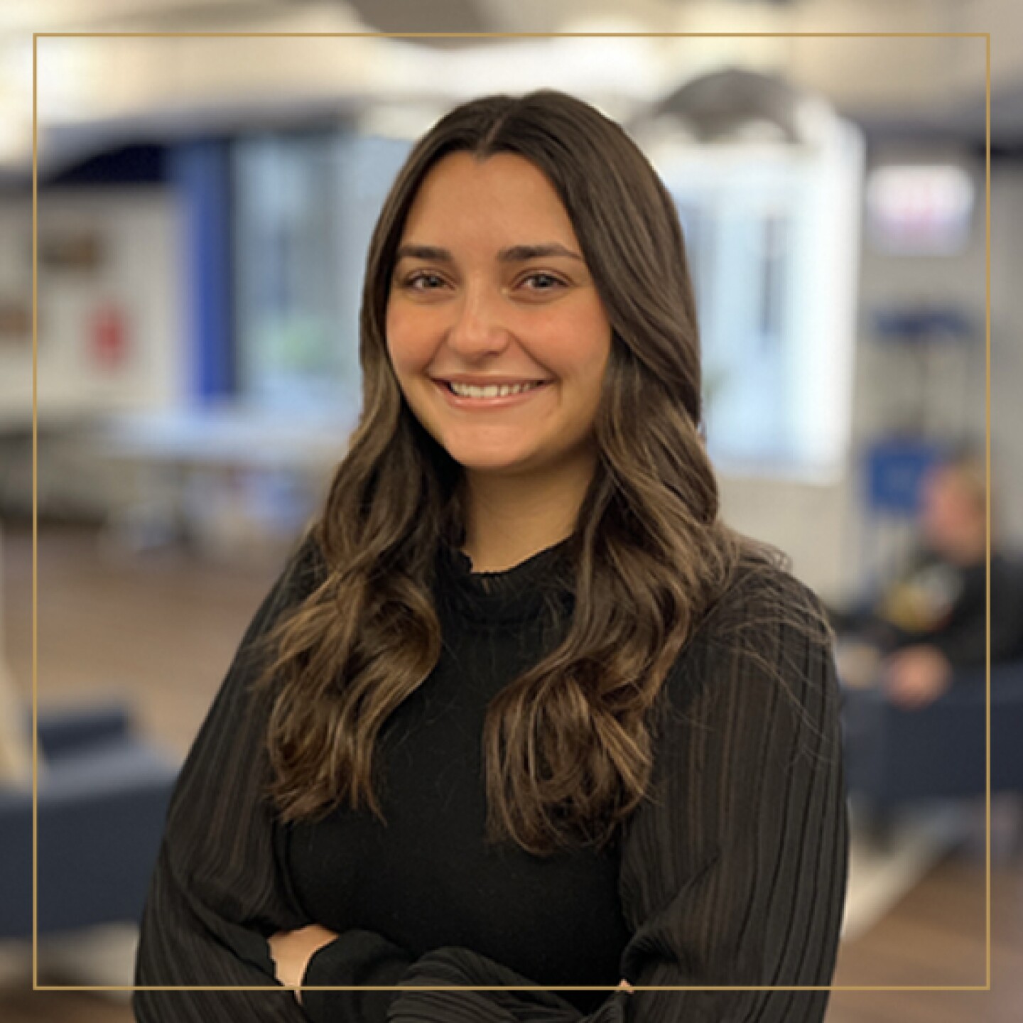 Woman smiling in black blouse