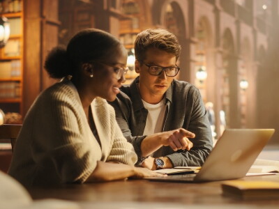 Two MSW students reviewing a virtual case simulation together