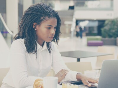 Student learning online on her laptop