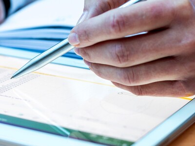 Accounting on a tablet computer, close-up