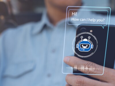 smart phone with Hi how can I help you bubble