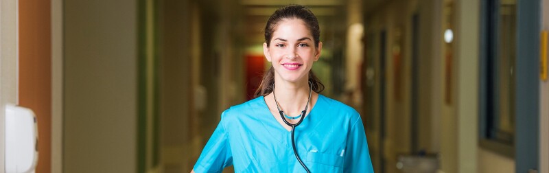 Nurse standing in a hospital corridor
