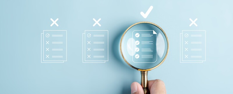 Inspecting the details of four options with a magnifying glass