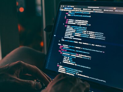 Person coding on computer