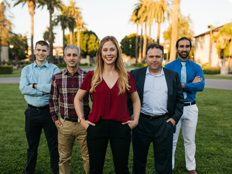 Group of five SCU students standing on campus