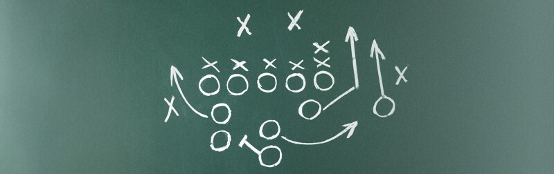 Chalkboard with scheme of football game