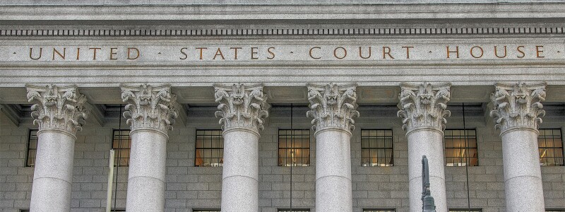 United Stated Court House federal building with six ornate columns,