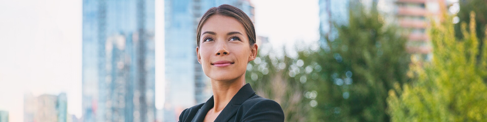 Happy-Businesswoman-Smiling-Outside