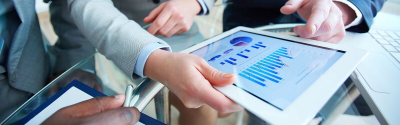 people looking at Business intelligence analyst dashboard on virtual screen