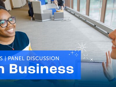 Two women in a conversation in a hall