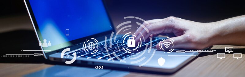 Close up businessman hand typing or working on laptop for programming about cyber security.